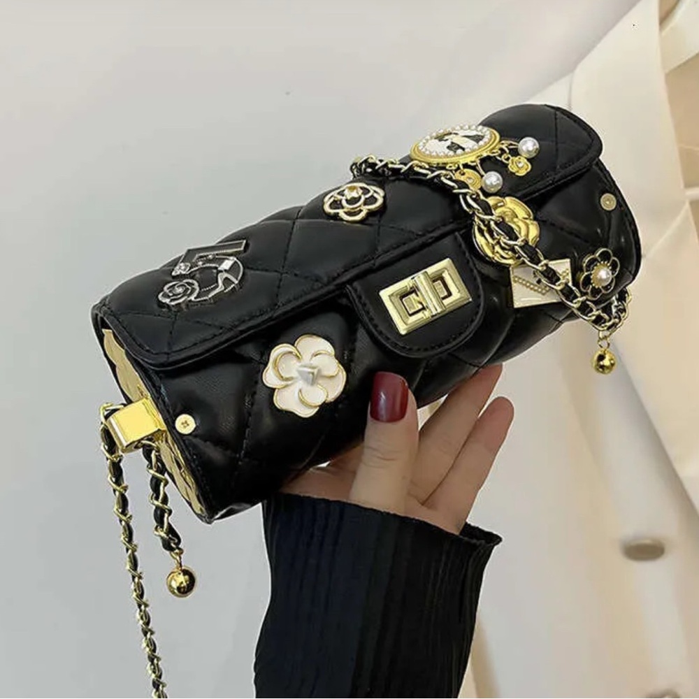 Luxury Black and Gold Cylindrical Clutch with Chain Strap